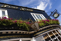 England, East Sussex, Brighton, The Lanes, Angled view of The Pump House exterior, one of the oldest pubs in the city with pink Petunias in window boxes.