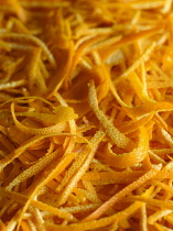Orange, Citrus sinensis, A mass of orange zest, peel cut in fine strips.
