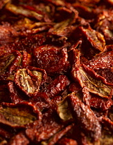 Tomato, Lycopersicon esculentum, Plum Tomato, Top view of a lot of split sun dried tomatoes.