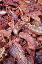 Tomato, Lycopersicon esculentum, Mass of red sun dried tomatoes.