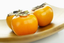 Sharon fruit, Persimmon, Orange subject.