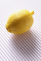 Lemon, Citrus limon, Studio shot of yellow coloured fruit.