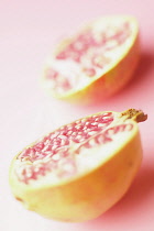 Pomegranate, Punica granatum, Pink subject, Pink background.