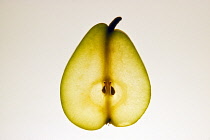 Food, Fruit, Pear, Sliced section on lightbox showing stalk, core and pips.