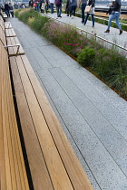 USA, New York, Manhattan, wooden benches on the High Line linear park on an elevated disused railroad spur called The West Side Line. USA, New York State, New York City.