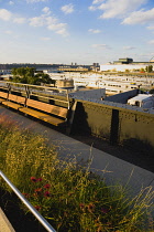 USA, New York, Manhattan, deserted northern section of the High Line linear park on the disused elevated West Side Line railroad beside the Hudson Rail Yards with trains in Midtown. USA, New York Sta...