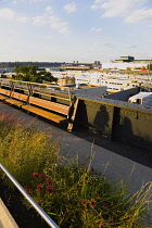 USA, New York, Manhattan, deserted northern section of the High Line linear park on the disused elevated West Side Line railroad beside the Hudson Rail Yards with trains in Midtown. USA, New York Sta...