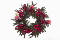 Festivals, Religious, Christmas, Wreath of artificial leaves and berries with pine cones and apples. Festivals, Religious, Christmas.