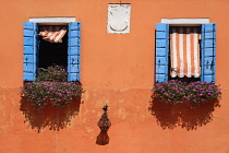 Italy, Veneto, Burano Island, Colourful row of house facades. Italy, Veneto, Venice.