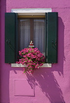 Italy, Veneto, Burano Island, Colourful row of house facades. Italy, Veneto, Venice.