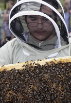 Beekeeper at Honey Bee Fayre, Yalding.