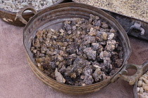 Jordan, Petra, Black Hojari frankincense olibanum resin incense for sale. Petra Archeological Park is a Jordanian National Park and a UNESCO World Heritage Site. Frankincense or olibanum resin for inc...